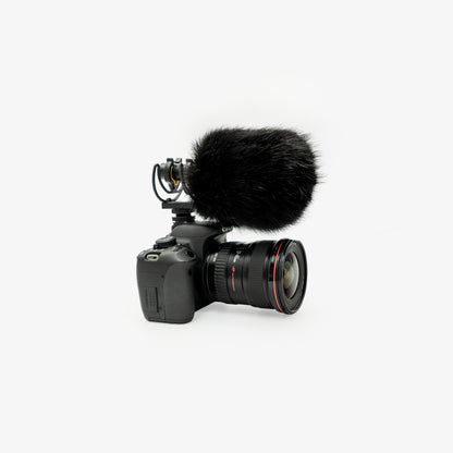 The Foam Wind Cover, size XS, on an on-camera shotgun microphone