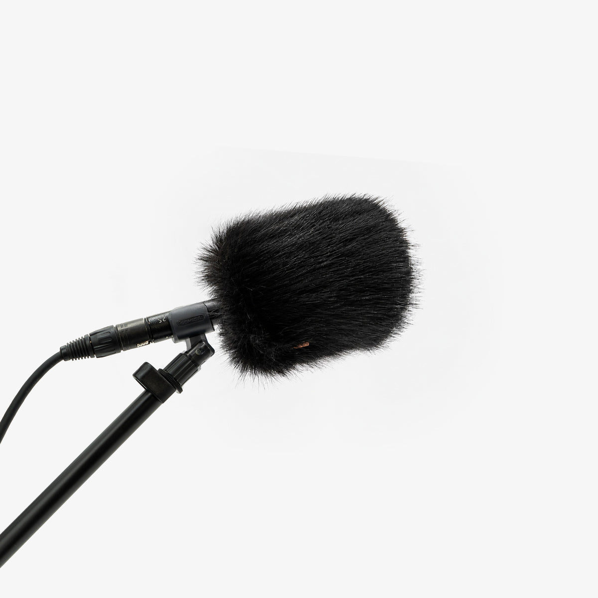 The Foam Wind Cover, size XS+, on a boom-mounted shotgun microphone