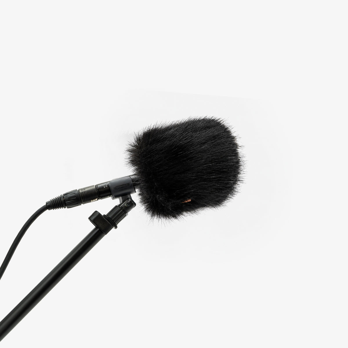 The Foam Wind Cover Kit, size XS, on a boom-mounted shotgun microphone